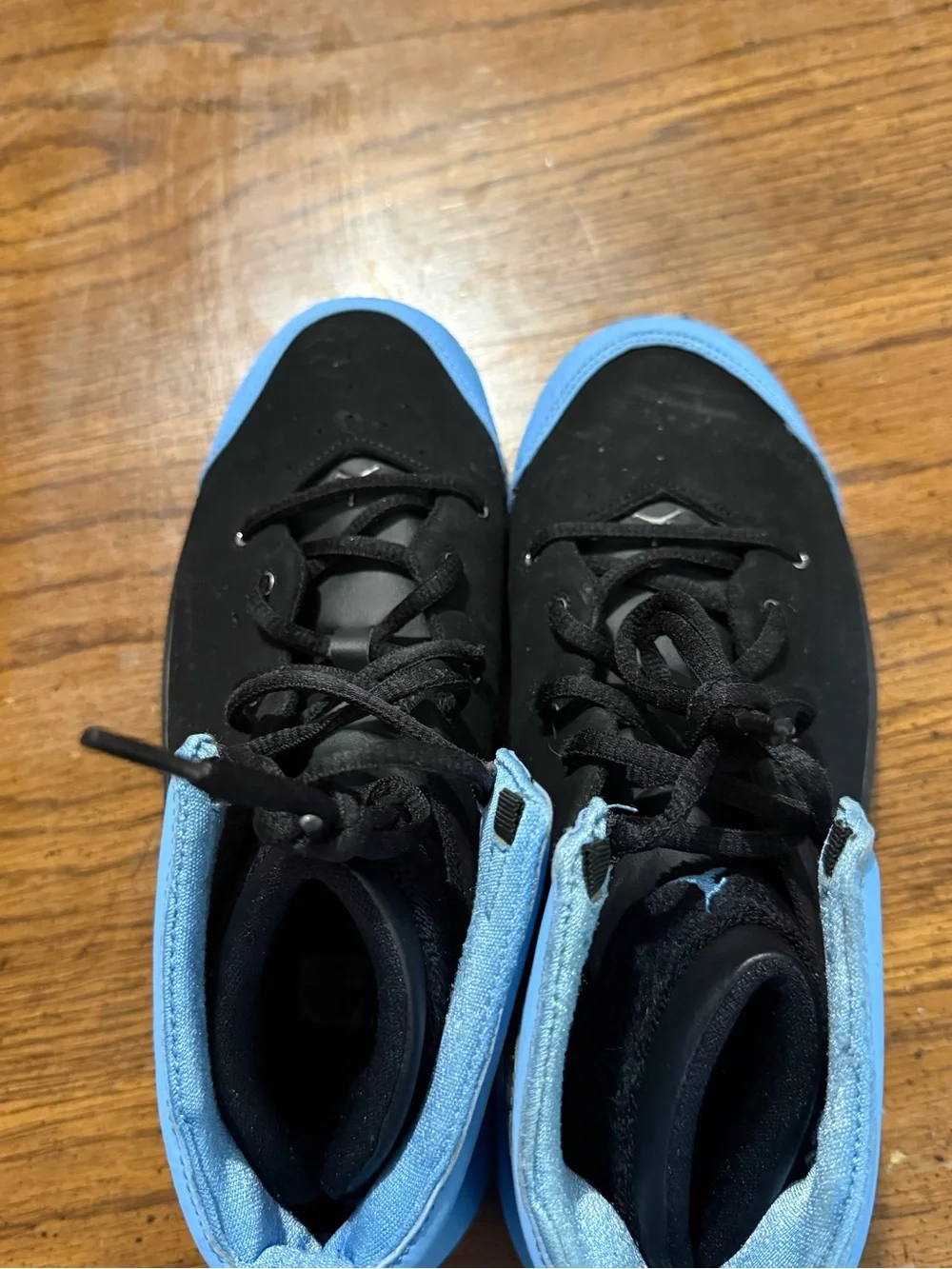 Kids Nike Melo 1.5 shoes black/university blue.